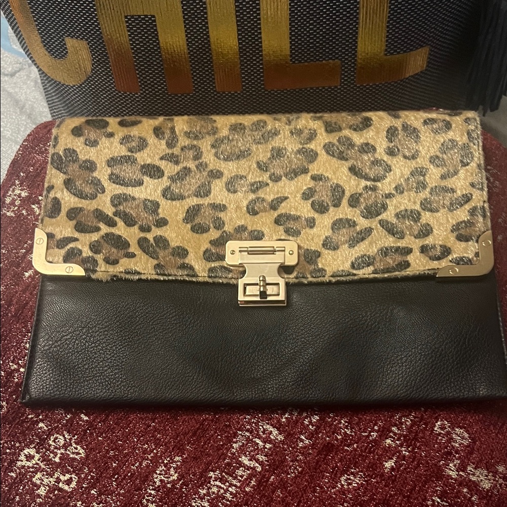 Chic Leopard Print and Black Clutch